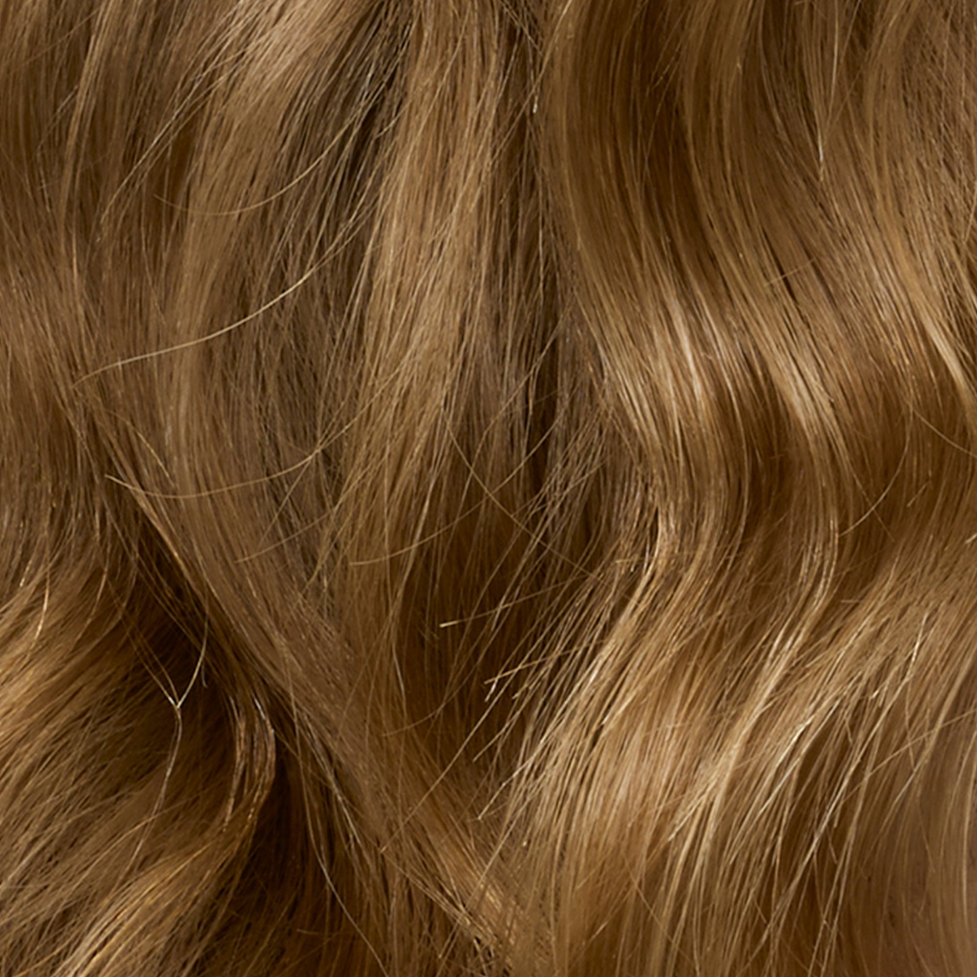 Close Up of Wavy Hair After Using Gloss Mode Hair Treatment Oil