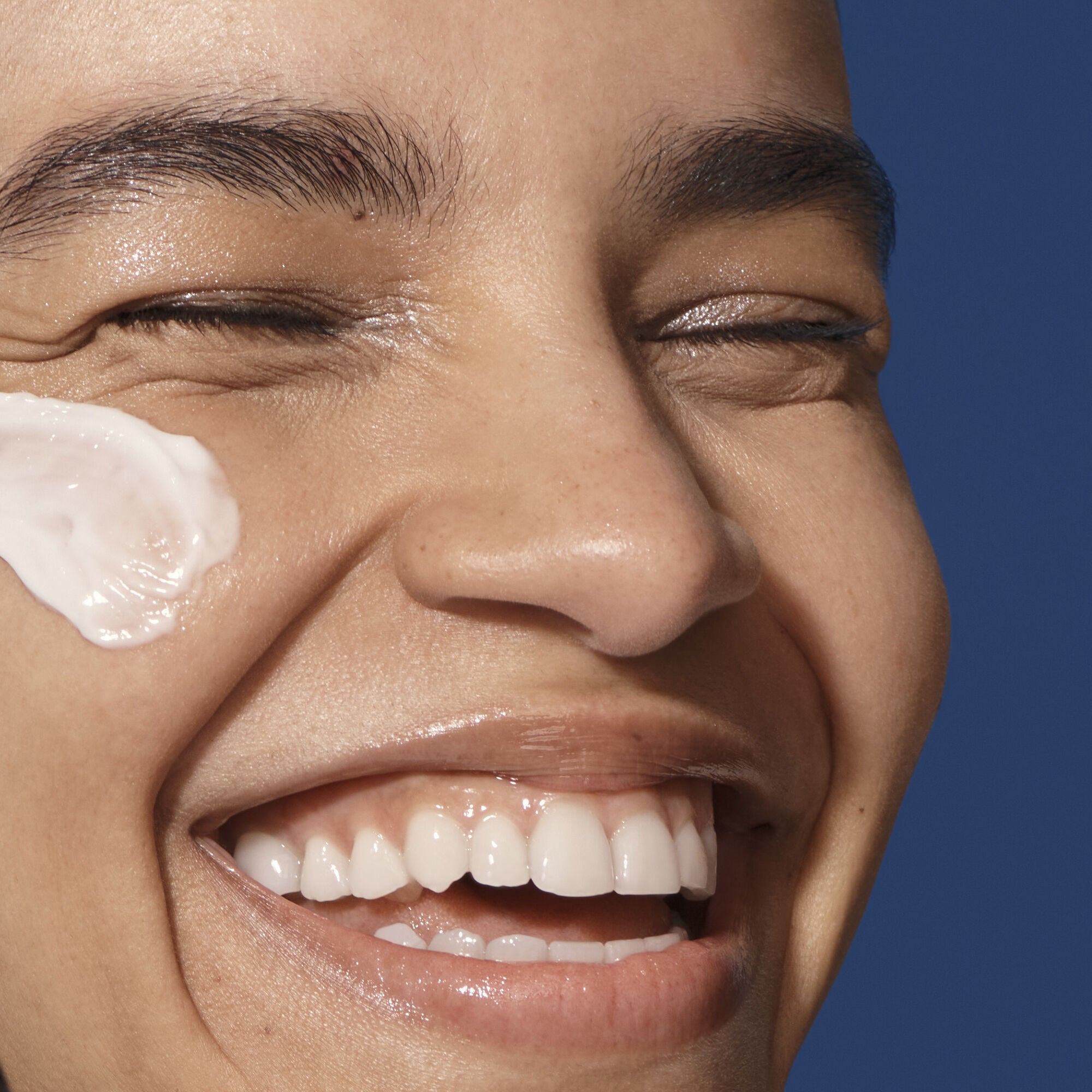 Close-up of a person who has applied cream to their face